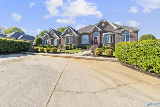 view of front of home with brick siding
