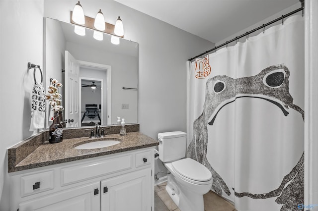 full bathroom featuring tile patterned flooring, vanity, toilet, a ceiling fan, and curtained shower