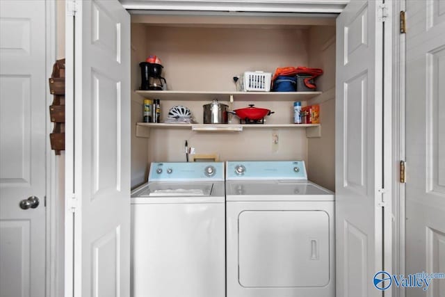 washroom featuring washer and dryer