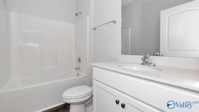 304 Wraywood Rd, Huntsville, AL 35810 - full bathroom with vanity, toilet, shower / bathtub combination, and wood finished floors