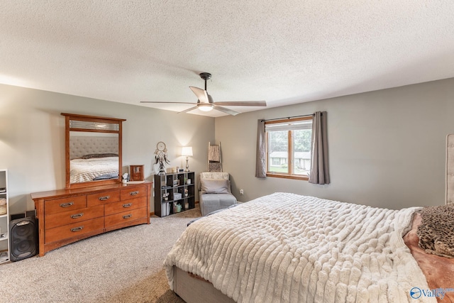 1104 Princeton Dr, Madison, AL 35758 - bedroom with carpet floors, a textured ceiling, and a ceiling fan