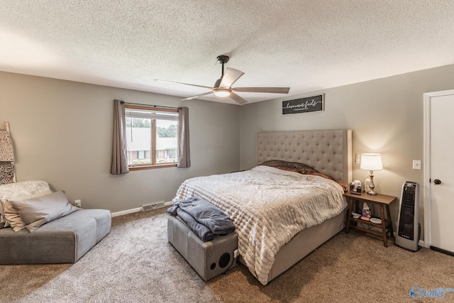 1104 Princeton Dr, Madison, AL 35758 - bedroom with carpet, a ceiling fan, and a textured ceiling