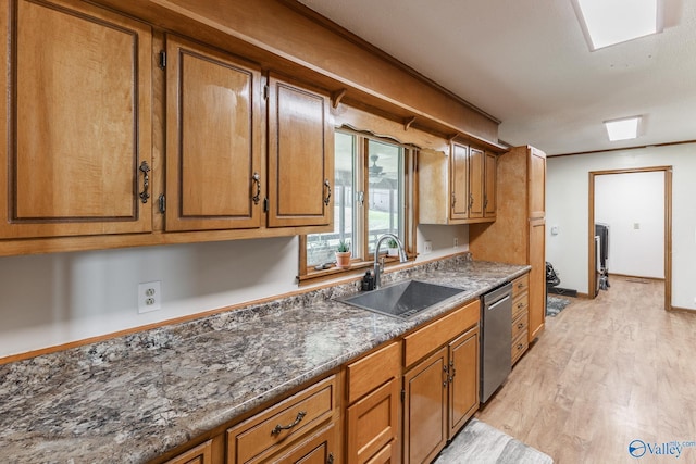 1104 Princeton Dr, Madison, AL 35758 - kitchen featuring brown cabinetry, light wood-type flooring, stainless steel dishwasher, and dark stone counters
