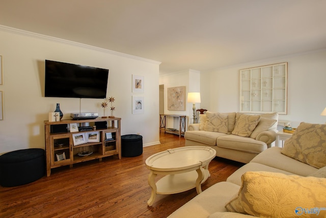 living room with crown molding and dark hardwood / wood-style flooring