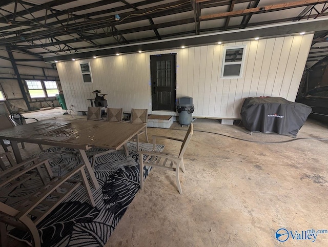 exterior space featuring grilling area and outdoor dining space