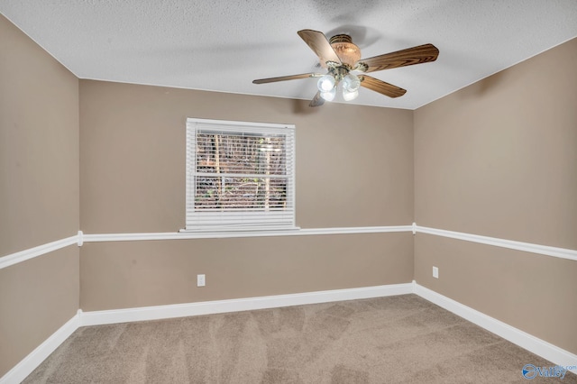 unfurnished room featuring carpet, a textured ceiling, and ceiling fan