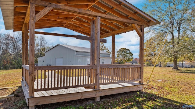 wooden deck with a lawn