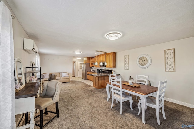 carpeted dining space with a textured ceiling, an AC wall unit, and sink