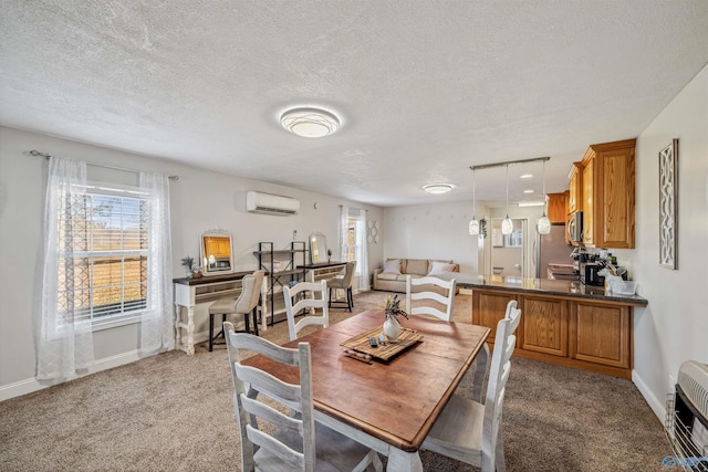 dining room with a wall mounted air conditioner, a textured ceiling, light colored carpet, and heating unit