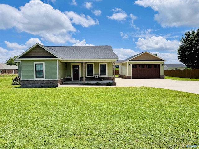 624 2nd Ave S, Loretto, TN 38469 - view of front of property featuring covered porch, concrete driveway, an attached garage, and a shingled roof