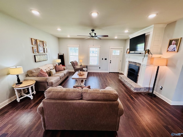 624 2nd Ave S, Loretto, TN 38469 - living room featuring dark wood finished floors, a fireplace, ceiling fan, and recessed lighting