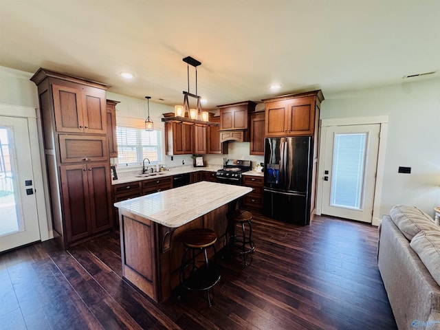 624 2nd Ave S, Loretto, TN 38469 - kitchen featuring refrigerator with ice dispenser, range with electric cooktop, dark wood-type flooring, dishwasher, and recessed lighting