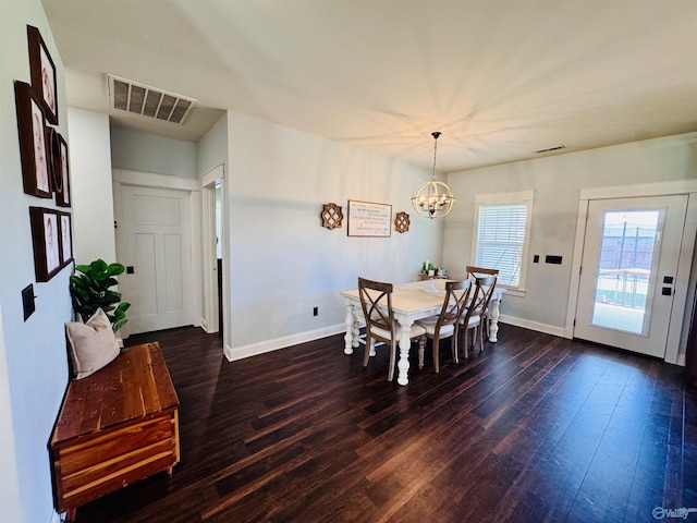 624 2nd Ave S, Loretto, TN 38469 - dining room with a chandelier and dark wood finished floors