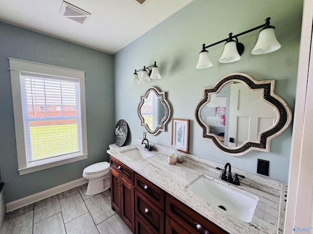 624 2nd Ave S, Loretto, TN 38469 - bathroom with toilet and double vanity
