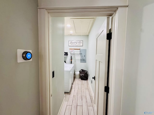 624 2nd Ave S, Loretto, TN 38469 - laundry room featuring washer and dryer, attic access, electric panel, and light wood-type flooring