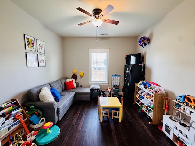 624 2nd Ave S, Loretto, TN 38469 - living room featuring hardwood / wood-style flooring and ceiling fan
