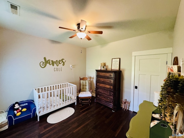 624 2nd Ave S, Loretto, TN 38469 - bedroom featuring wood finished floors, ceiling fan, and a nursery area