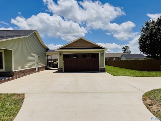 624 2nd Ave S, Loretto, TN 38469 - garage with concrete driveway