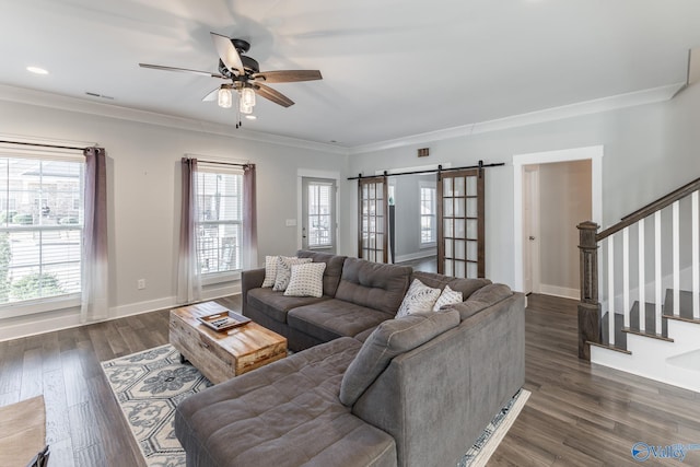 living room featuring ceiling fan, dark hardwood / wood-style flooring, french doors, and ornamental molding