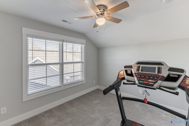 exercise room with ceiling fan, lofted ceiling, and carpet floors