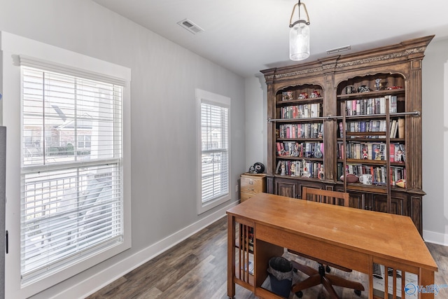 office space with dark hardwood / wood-style floors