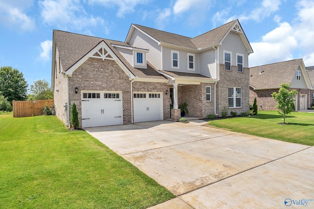 view of front of home featuring a garage and a front yard