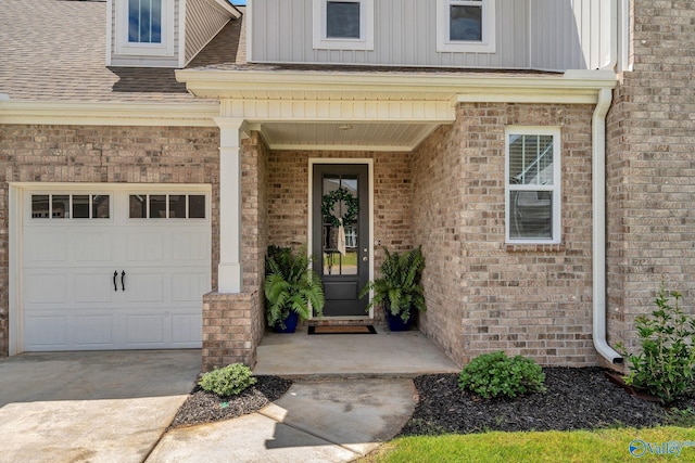 doorway to property featuring a garage