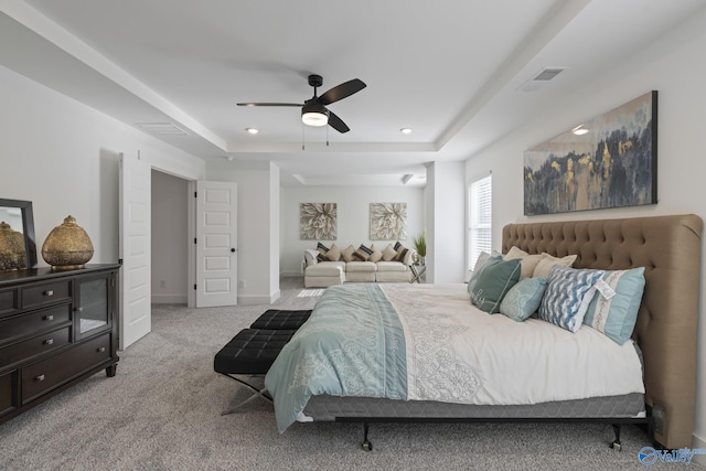 24139 Patriot Dr, Athens, AL 35613 - carpeted bedroom featuring ceiling fan and a tray ceiling