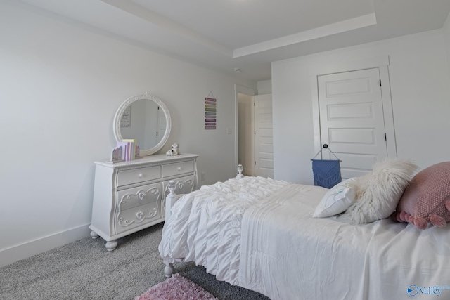 24139 Patriot Dr, Athens, AL 35613 - bedroom featuring light colored carpet and a tray ceiling