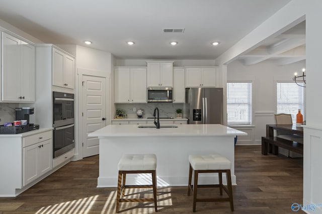 24139 Patriot Dr, Athens, AL 35613 - kitchen with white cabinetry, sink, a center island with sink, and appliances with stainless steel finishes