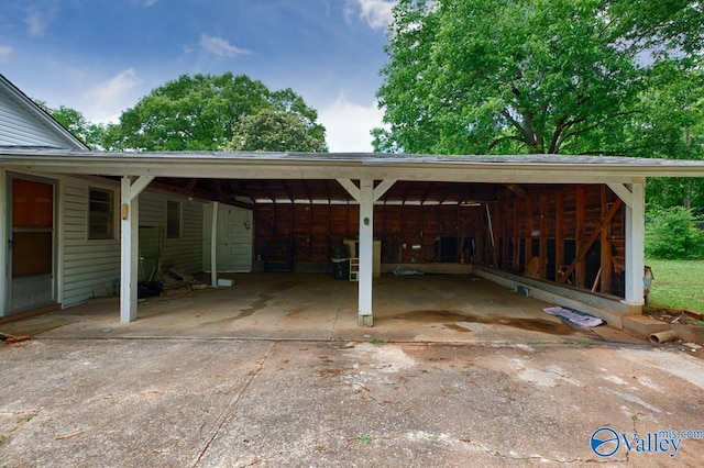 view of parking with a carport