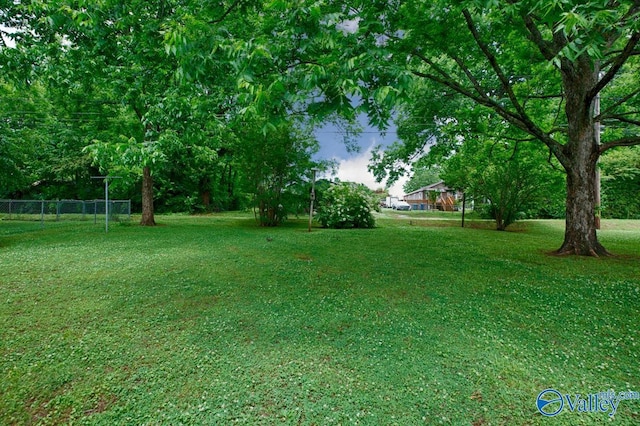 view of yard featuring fence