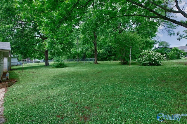 view of yard with fence