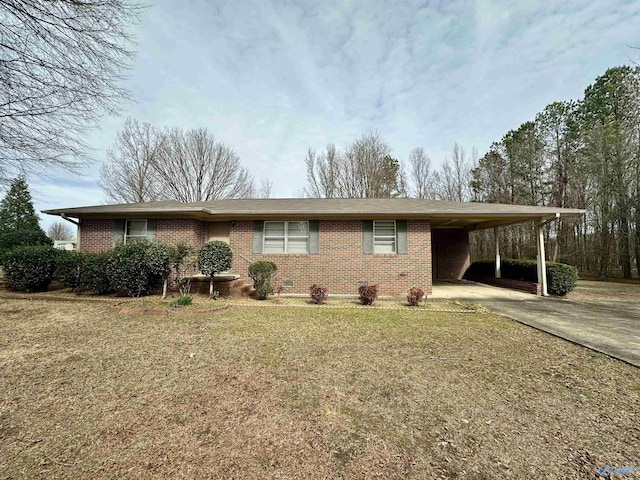 ranch-style home with a front lawn and a carport