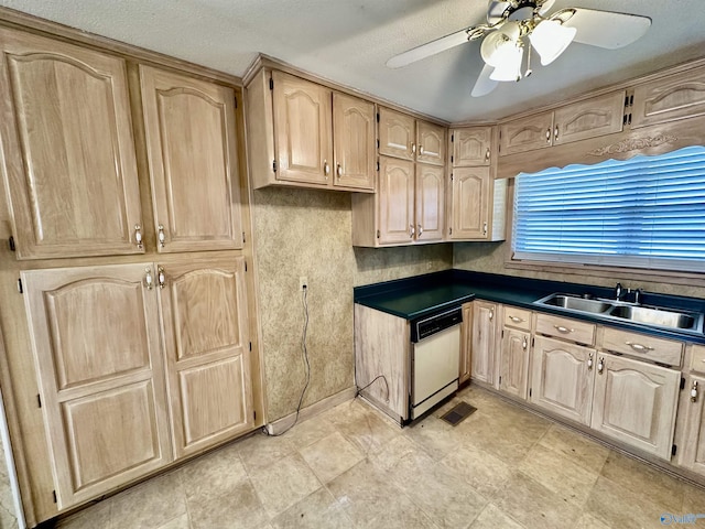 kitchen featuring ceiling fan, dishwasher, sink, and light brown cabinets