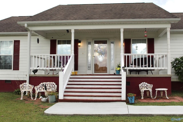 entrance to property with a porch