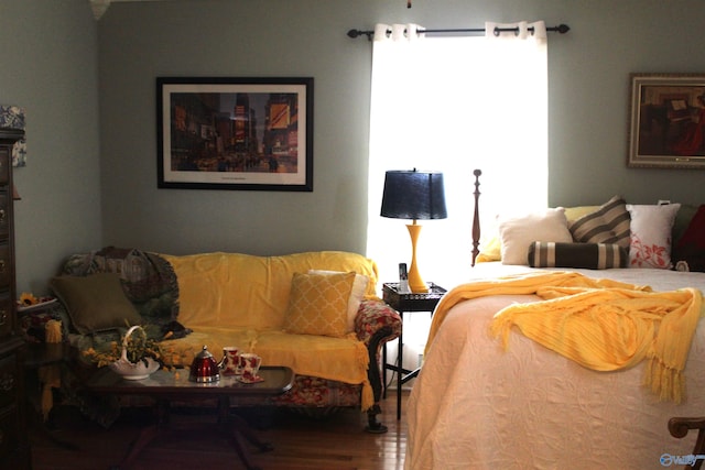 bedroom with hardwood / wood-style flooring