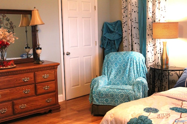 bedroom with light hardwood / wood-style flooring