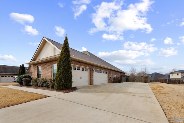 view of side of home with a garage