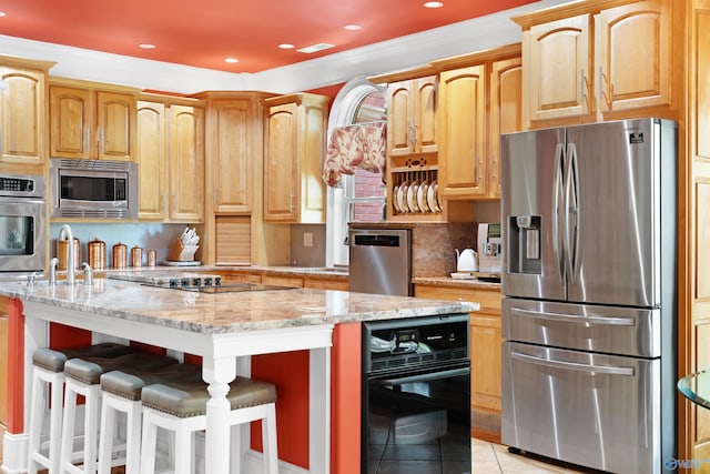 601 Smokey Mountain Cir, Huntsville, AL 35803 - kitchen featuring stainless steel appliances, a sink, light stone counters, light tile patterned flooring, and tasteful backsplash