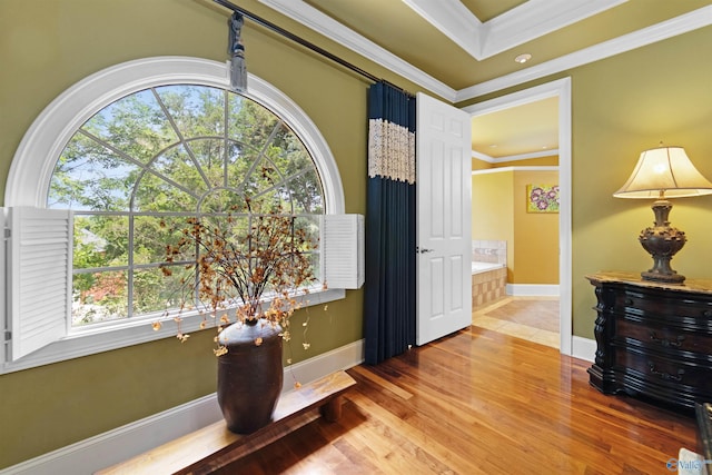 601 Smokey Mountain Cir, Huntsville, AL 35803 - living area featuring plenty of natural light, wood finished floors, baseboards, and ornamental molding
