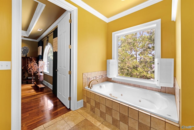 601 Smokey Mountain Cir, Huntsville, AL 35803 - full bathroom featuring ornamental molding, a jetted tub, healthy amount of natural light, baseboards, and tile patterned floors