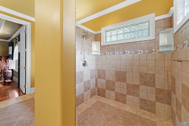 601 Smokey Mountain Cir, Huntsville, AL 35803 - full bathroom featuring tiled shower, crown molding, and plenty of natural light