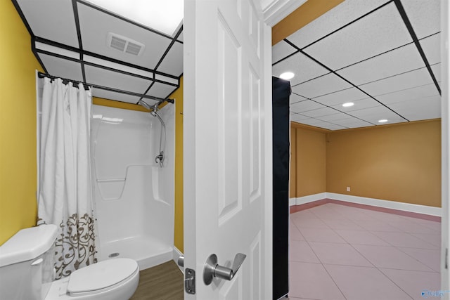 601 Smokey Mountain Cir, Huntsville, AL 35803 - bathroom with toilet, a stall shower, baseboards, recessed lighting, and tile patterned flooring
