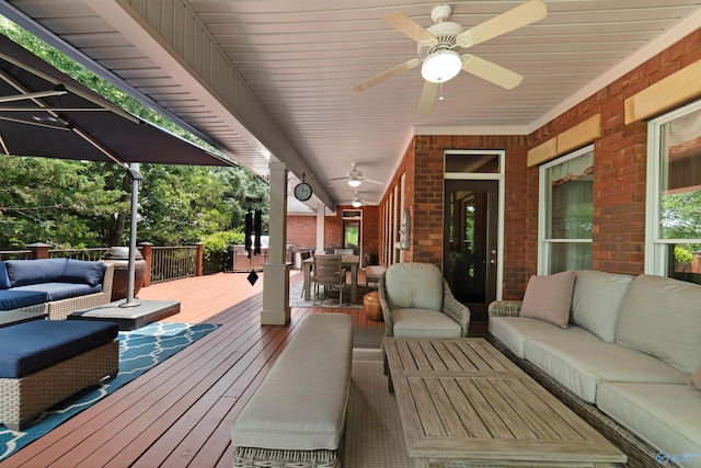 601 Smokey Mountain Cir, Huntsville, AL 35803 - deck featuring an outdoor hangout area, ceiling fan, and outdoor dining space