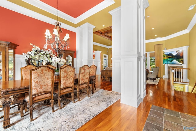 601 Smokey Mountain Cir, Huntsville, AL 35803 - dining room with decorative columns, wood finished floors, crown molding, a chandelier, and recessed lighting