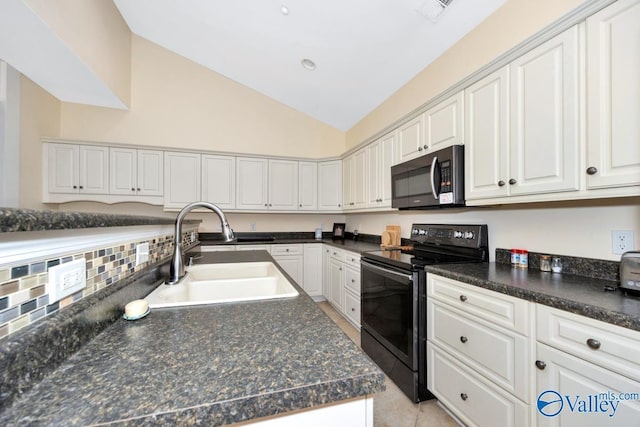 77 Valley Way Cir SE Unit 77, Huntsville, AL 35802 - kitchen with electric range, a sink, lofted ceiling, dark countertops, and white cabinetry