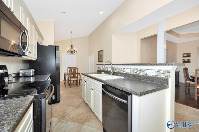 77 Valley Way Cir SE Unit 77, Huntsville, AL 35802 - kitchen with dishwasher, black microwave, electric range oven, a sink, and dark countertops