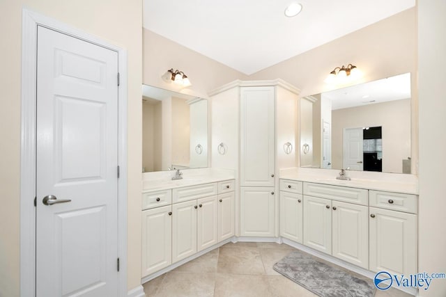 77 Valley Way Cir SE Unit 77, Huntsville, AL 35802 - full bath with two vanities, tile patterned floors, and recessed lighting