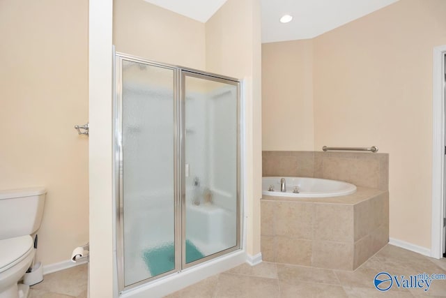 77 Valley Way Cir SE Unit 77, Huntsville, AL 35802 - full bathroom with toilet, a shower stall, tile patterned floors, a garden tub, and baseboards